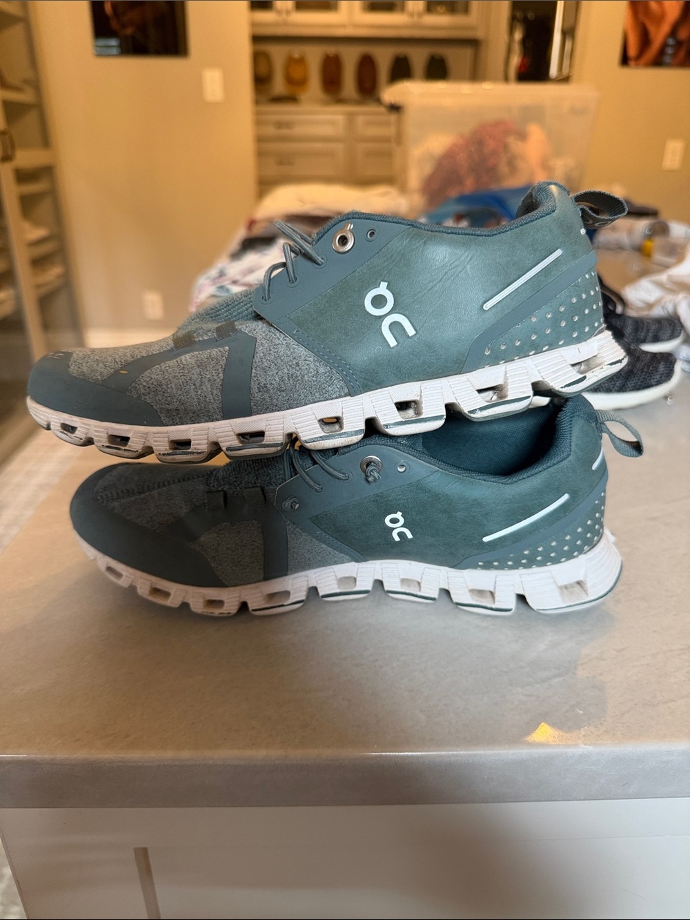 On Running women’s Cloud Sneaker in Teal and White